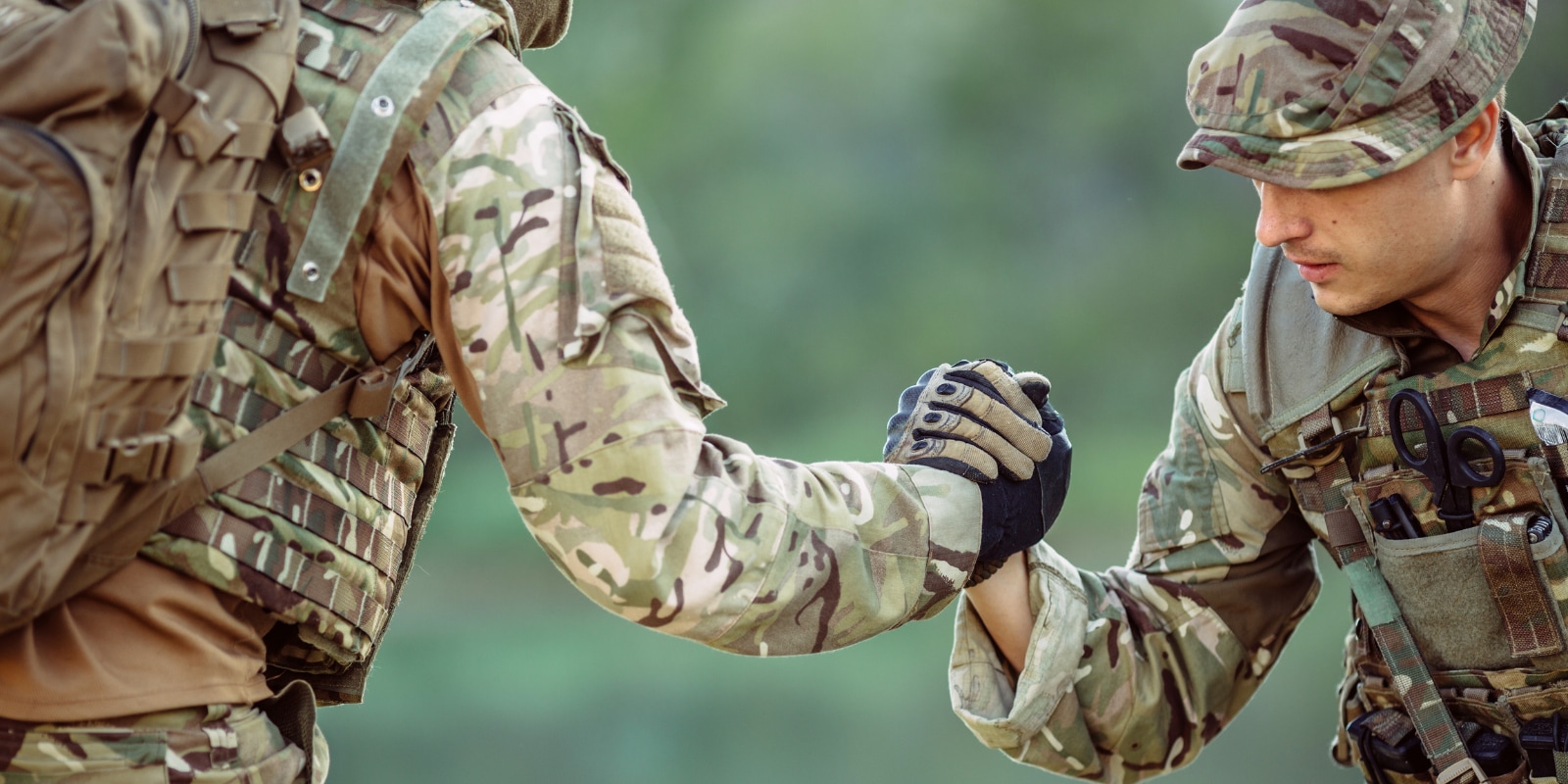 Soldier talking with a clinician.